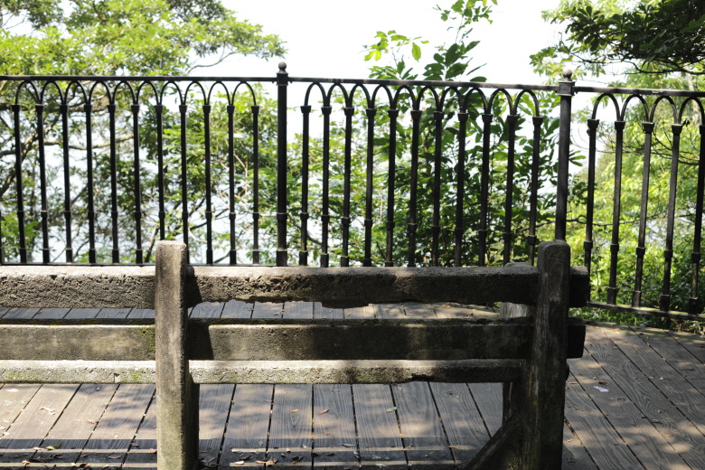 A bench by the road