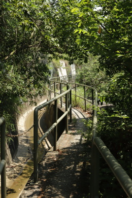 A man-made canal with a on the right hand side